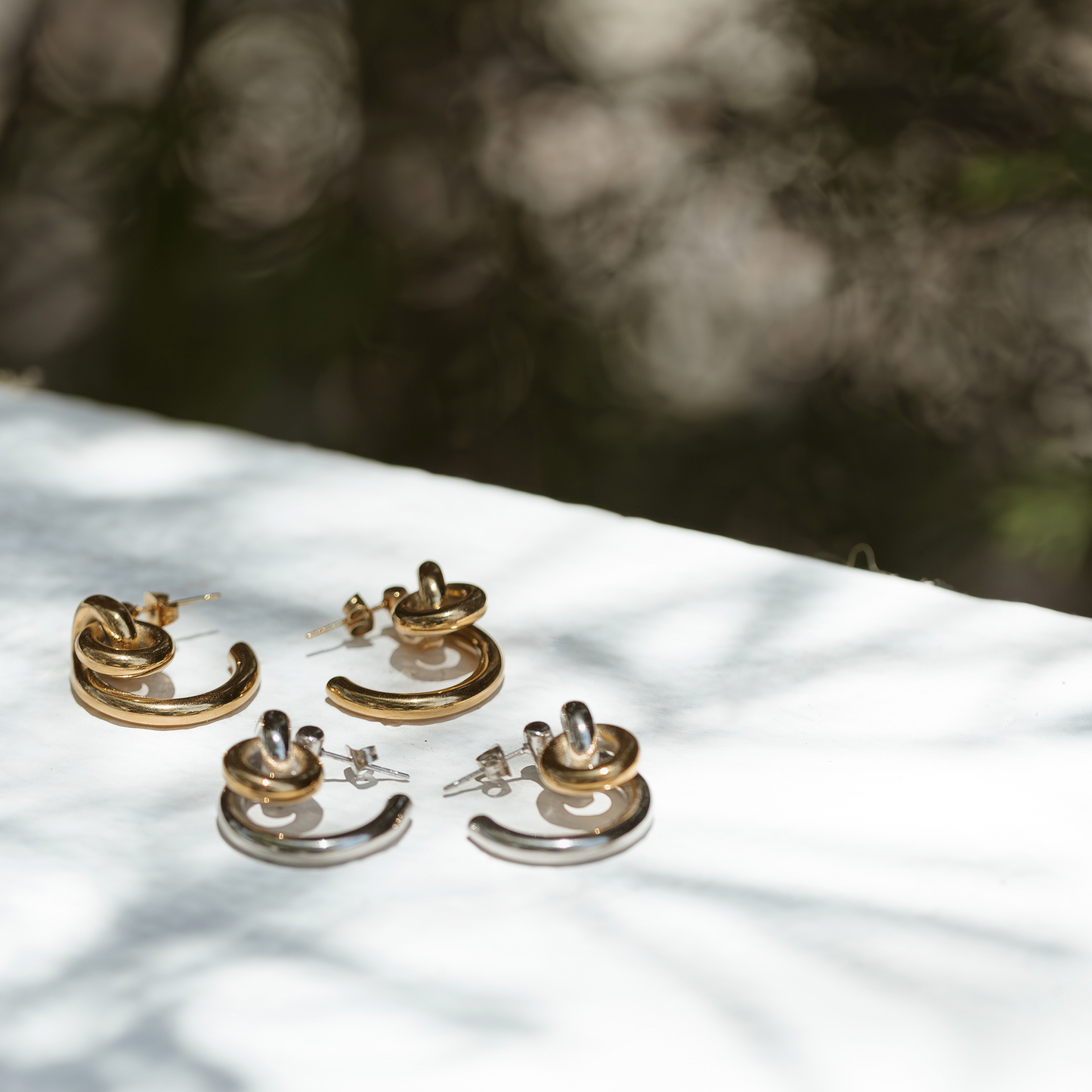 Arete Chapa de Oro y Rodio